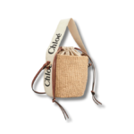 SMALL WOODY BASKET IN NATURAL FIBERS